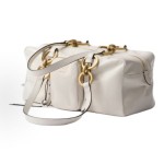 A medium-sized white women\'s handbag with a classic long-handled design from the PRADA Dangle brand